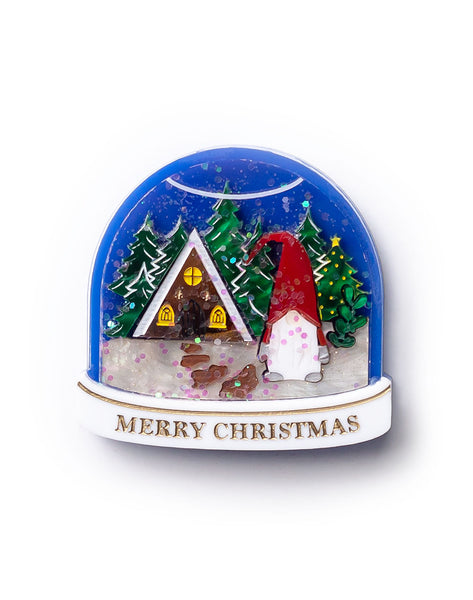 Christmas-themed snow globe with a house, trees, and a gnome on a white background